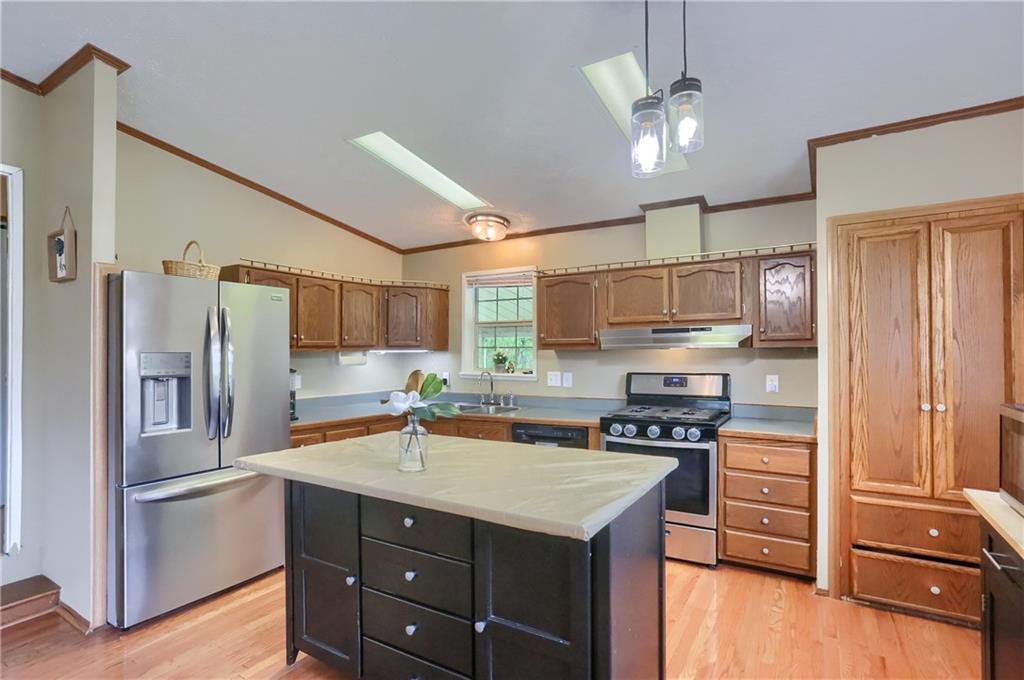 123 Merle Lane New Castle, PA 16101 - Photo 6 of 47 a kitchen with a refrigerator a sink stainless steel appliances and cabinets