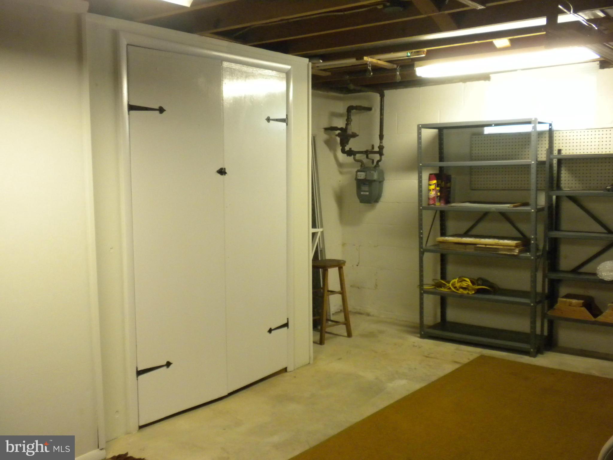 2114 Gaybrook Road Baltimore, MD 21244 - Photo 16 of 19 a view of walk in closet with empty racks