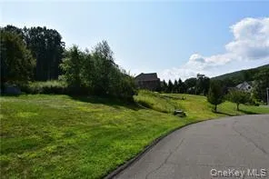 a view of a golf course with a garden