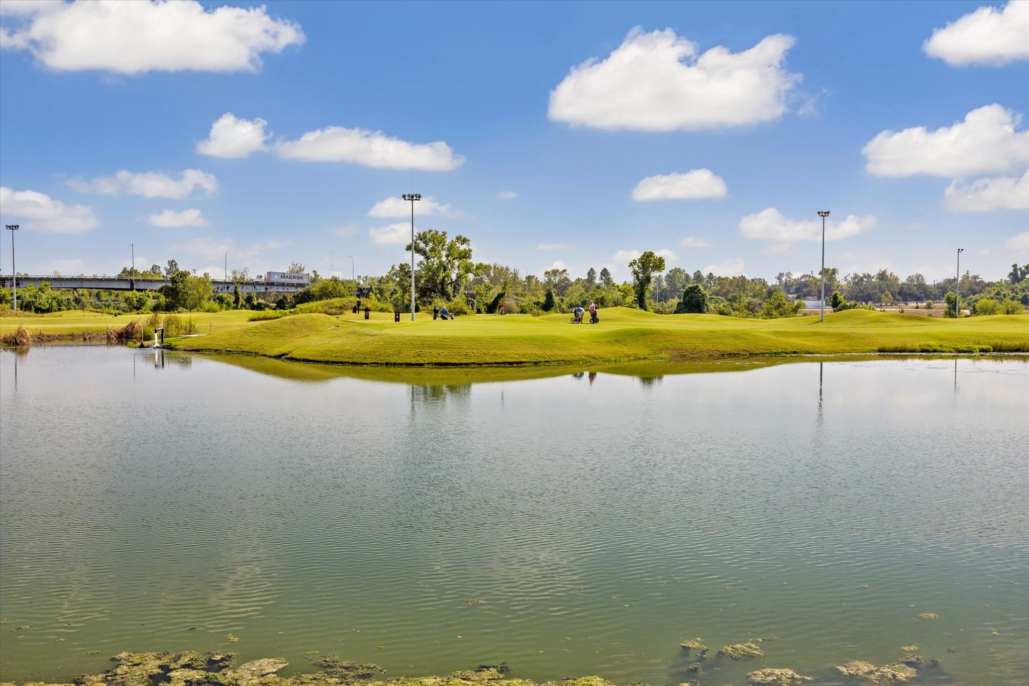 3432 Cline Street Houston, TX 77020 - Photo 17 of 22 a view of a lake with houses in the back