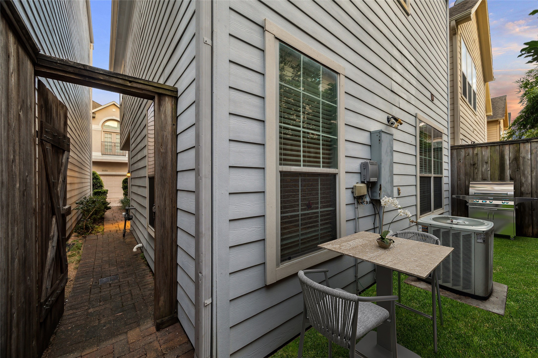 3432 Cline Street Houston, TX 77020 - Photo 2 of 22 a view of backyard with a table and chairs and potted plants