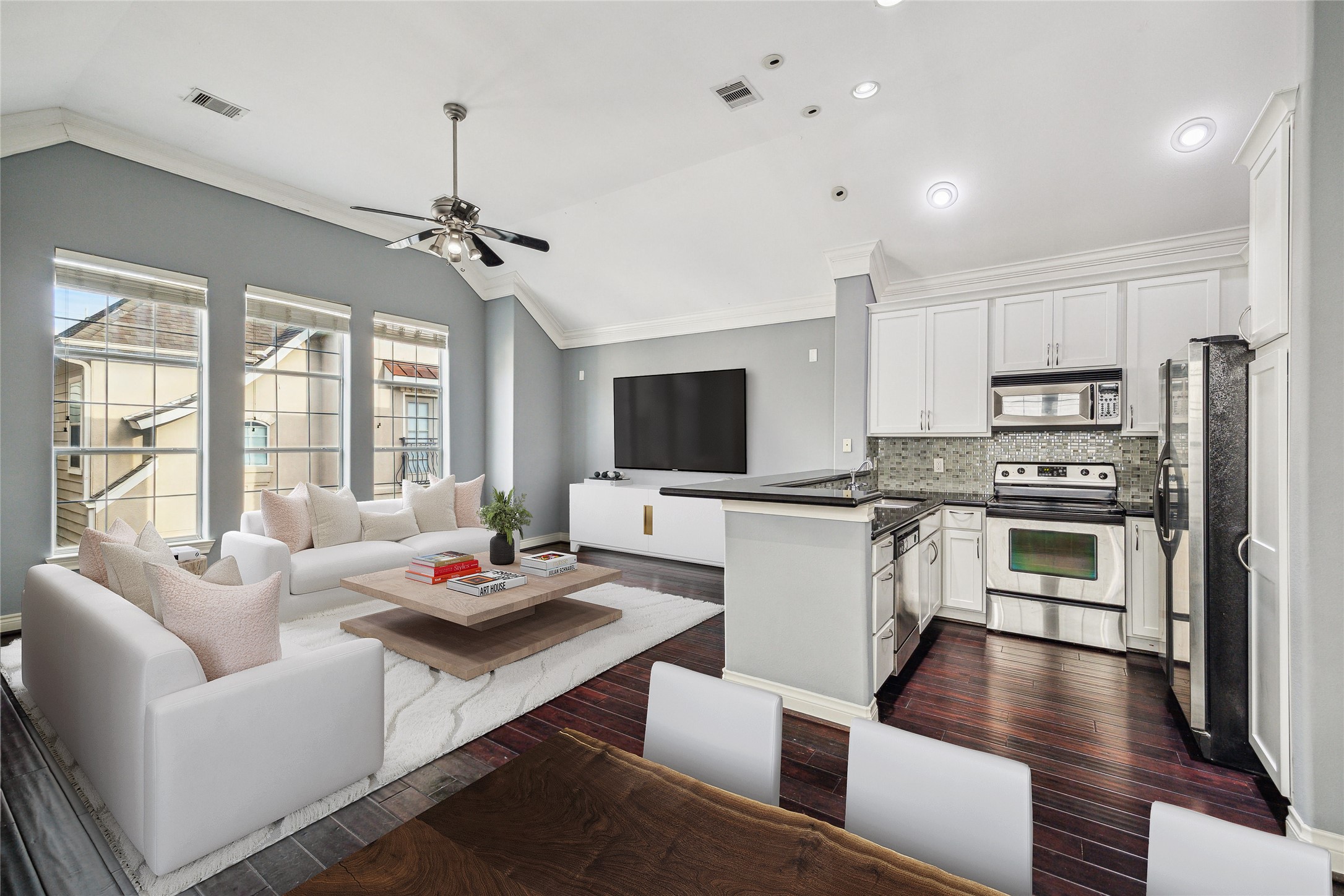 3432 Cline Street Houston, TX 77020 - Photo 4 of 22 a living room with stainless steel appliances furniture and a kitchen view