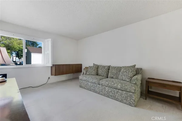 a bathroom with a shower and a toilet