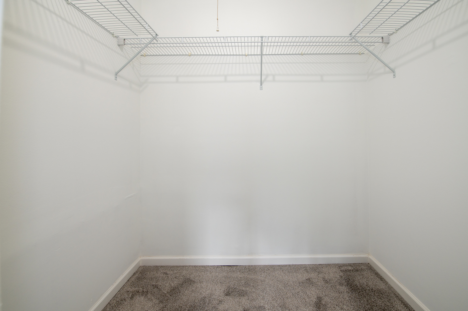 266 Butternut Lane Streamwood, IL 60107 - Photo 14 of 19 a view of a room with racks on the wall