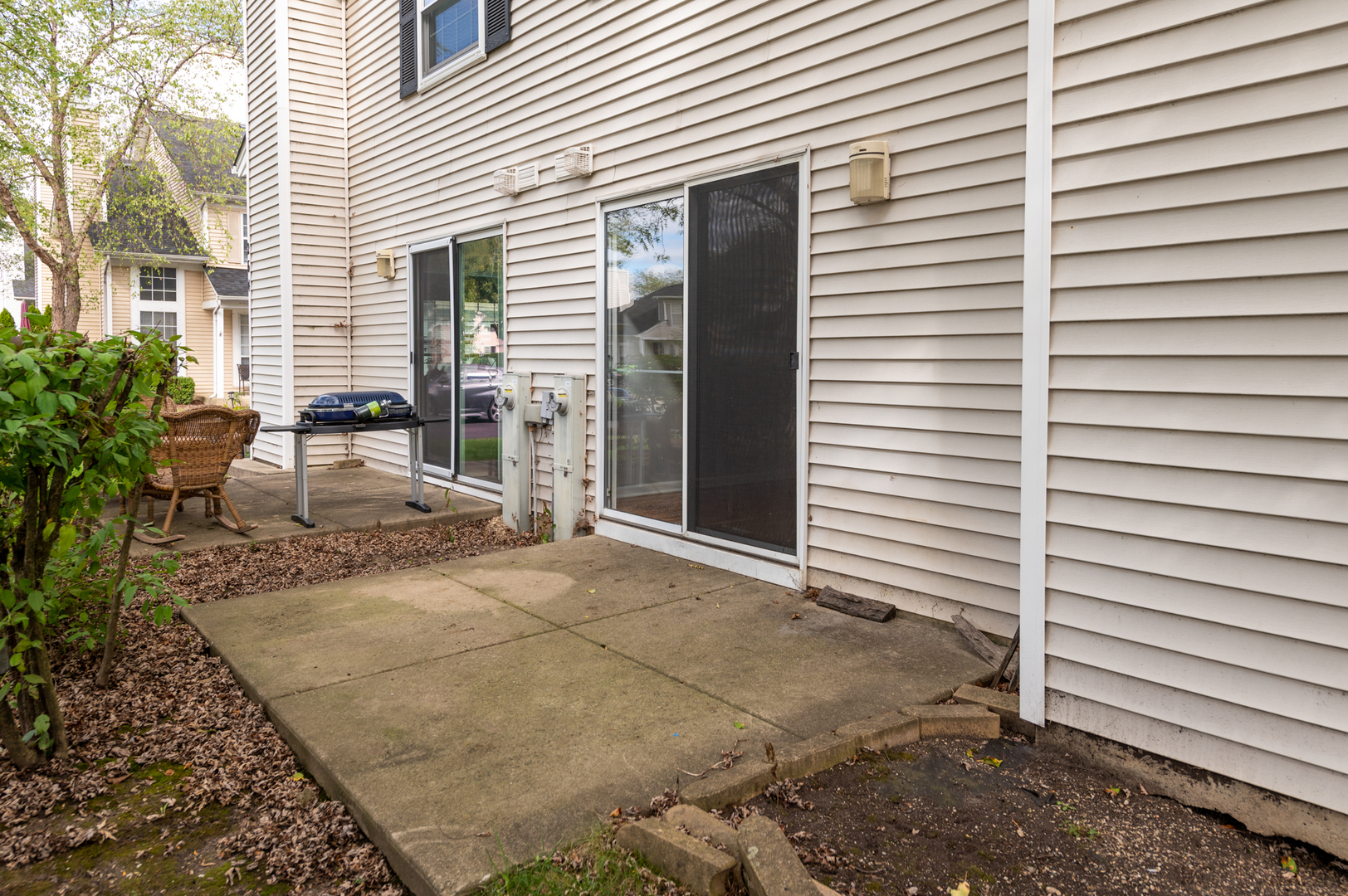 266 Butternut Lane Streamwood, IL 60107 - Photo 19 of 19 a view of a house with a patio