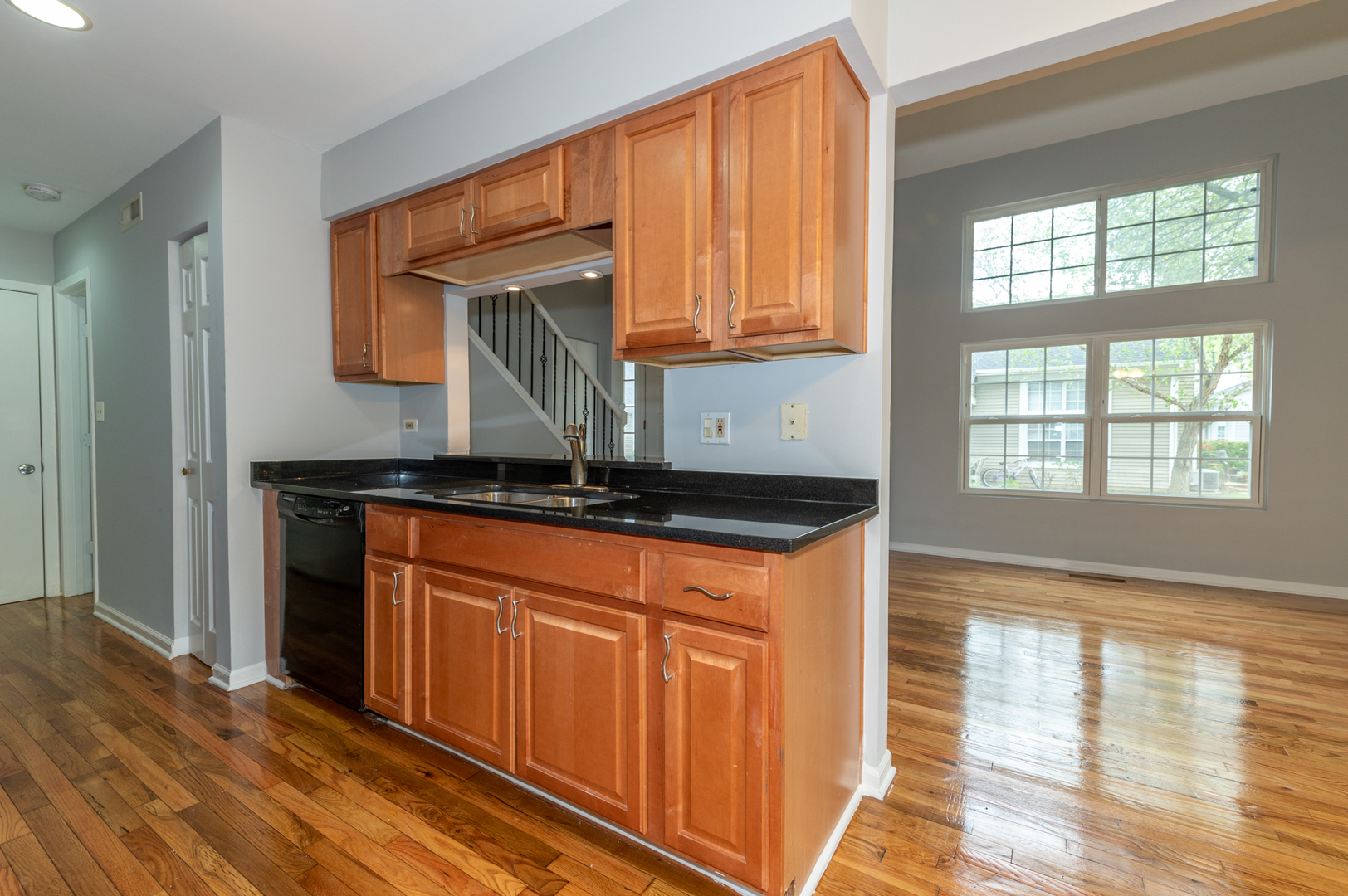 266 Butternut Lane Streamwood, IL 60107 - Photo 6 of 19 a kitchen with stainless steel appliances granite countertop a sink and a stove