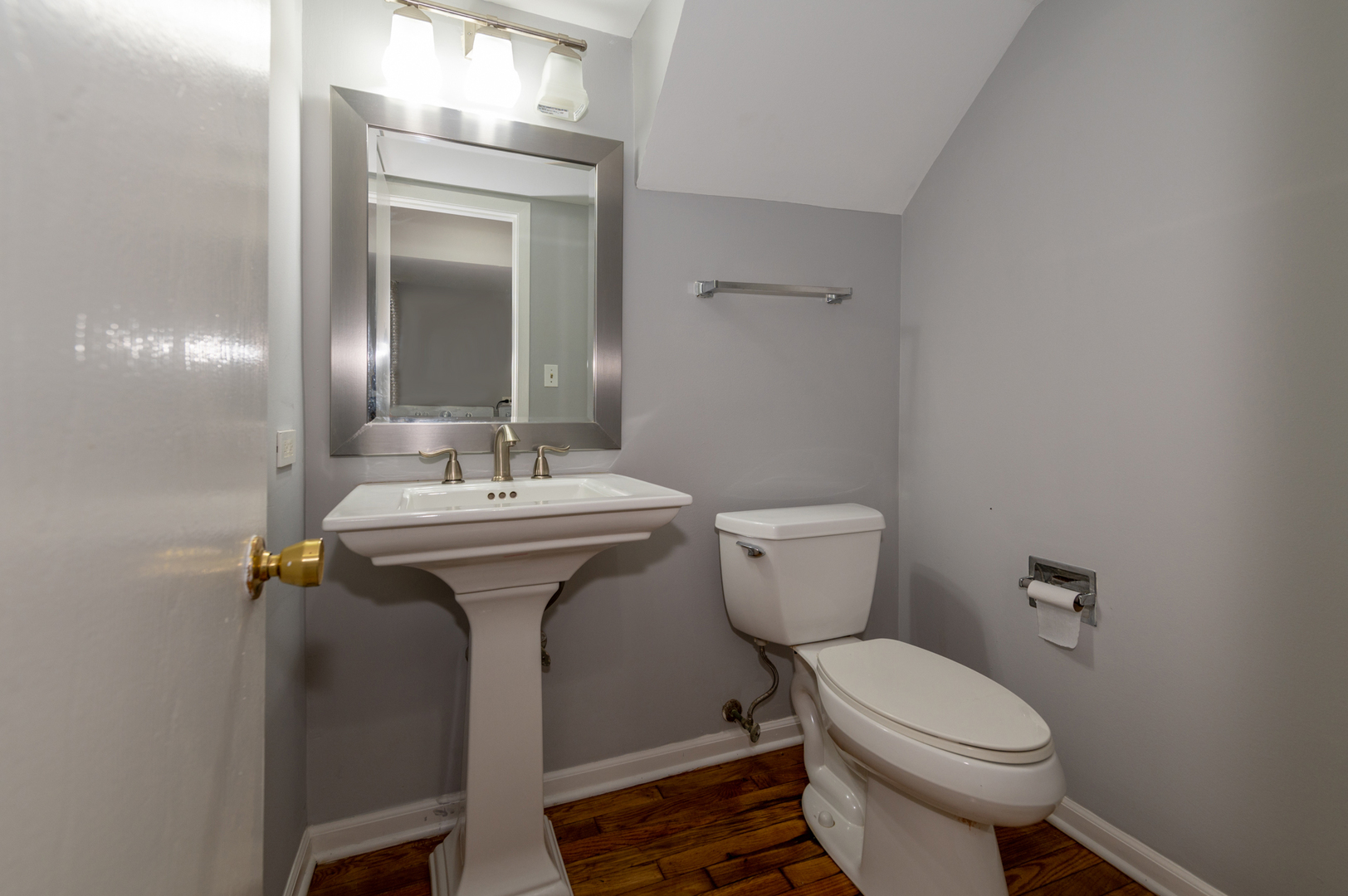 266 Butternut Lane Streamwood, IL 60107 - Photo 9 of 19 a bathroom with a sink toilet and mirror