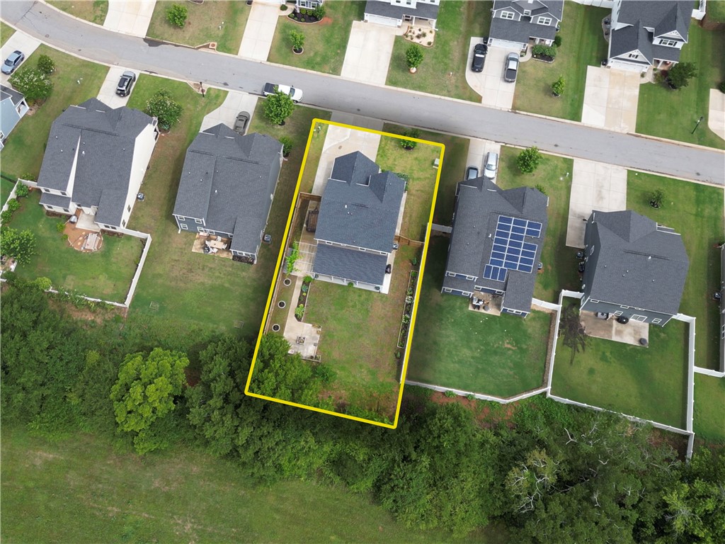 224 Bronson Ridge Anderson, SC 29621 - Photo 40 of 42 An aerial perspective reveals a well-maintained property with ample green space backing onto natural foliage.