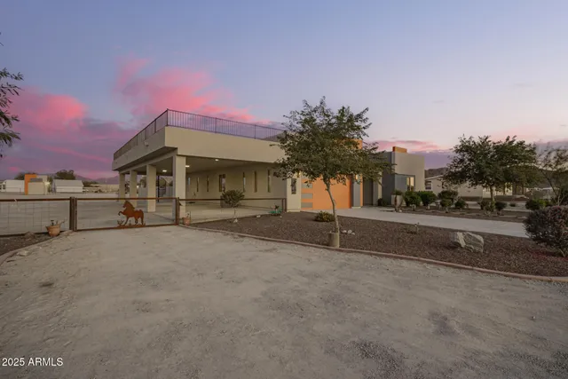 a view of a house with a street