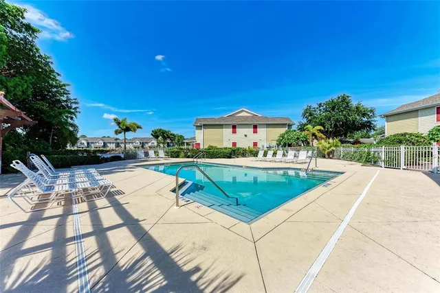 a view of a house with swimming pool