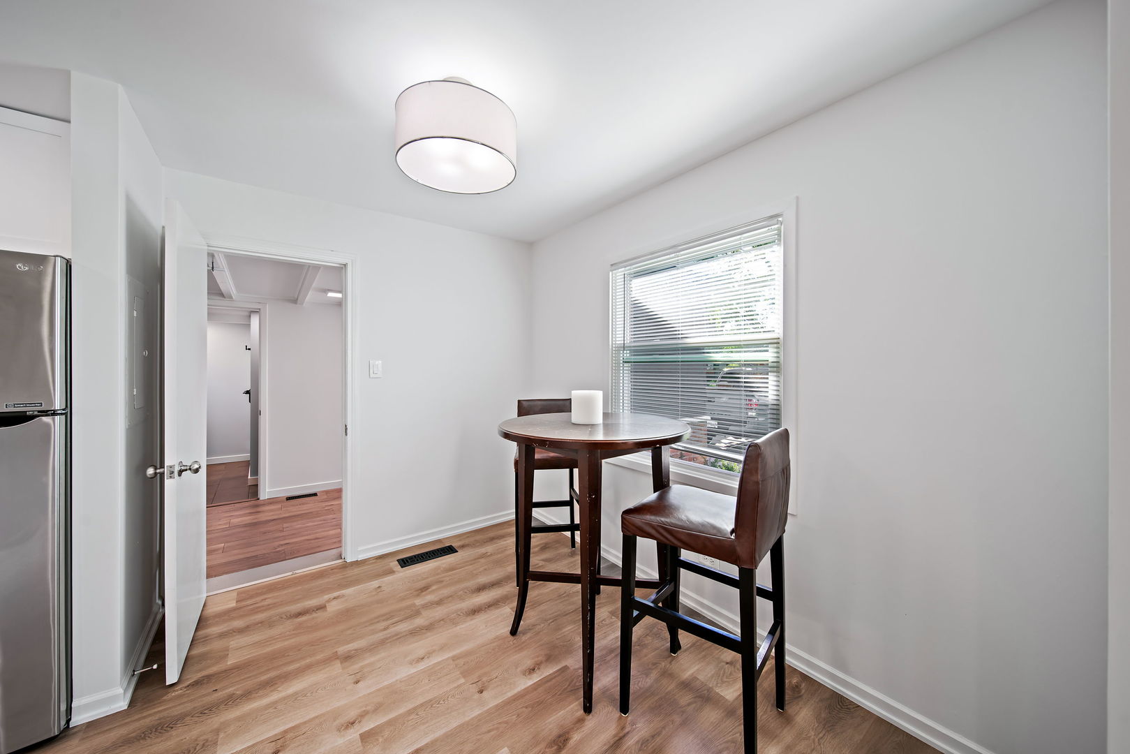 405 Marshall Road Northbrook, IL 60062 - Photo 11 of 27 a view of a dining room with furniture window and wooden floor