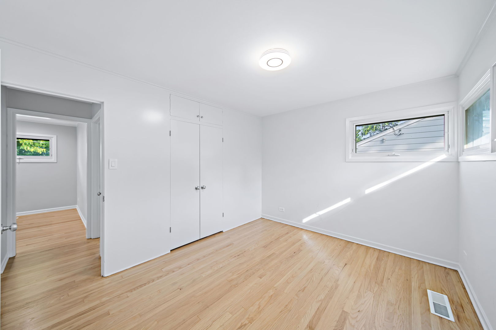 405 Marshall Road Northbrook, IL 60062 - Photo 21 of 27 a view of empty room with wooden floor