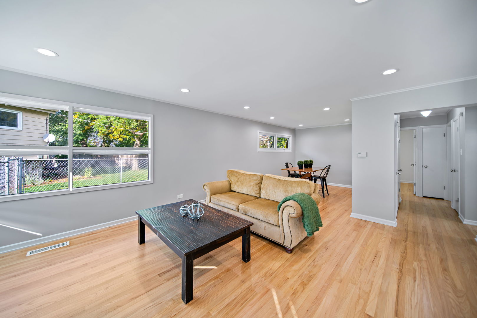 405 Marshall Road Northbrook, IL 60062 - Photo 4 of 27 a living room with furniture and a wooden floor