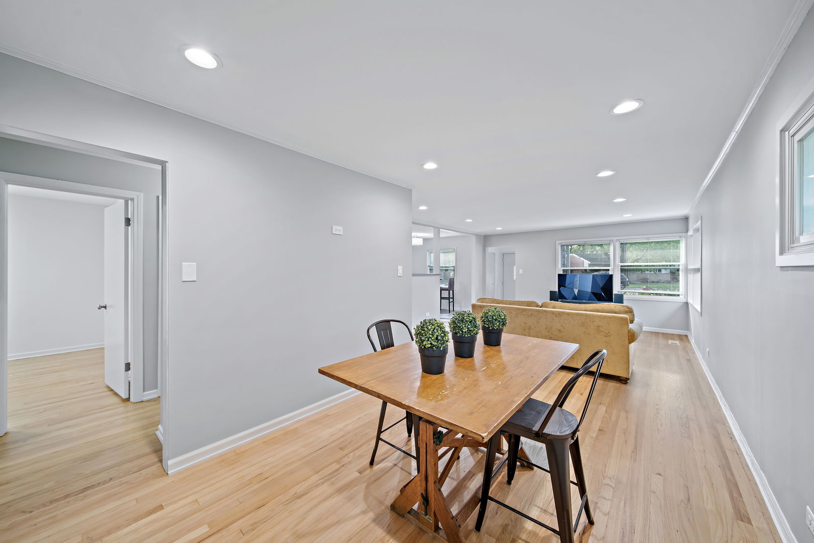 405 Marshall Road Northbrook, IL 60062 - Photo 10 of 27 a view of a dining room with furniture and wooden floor