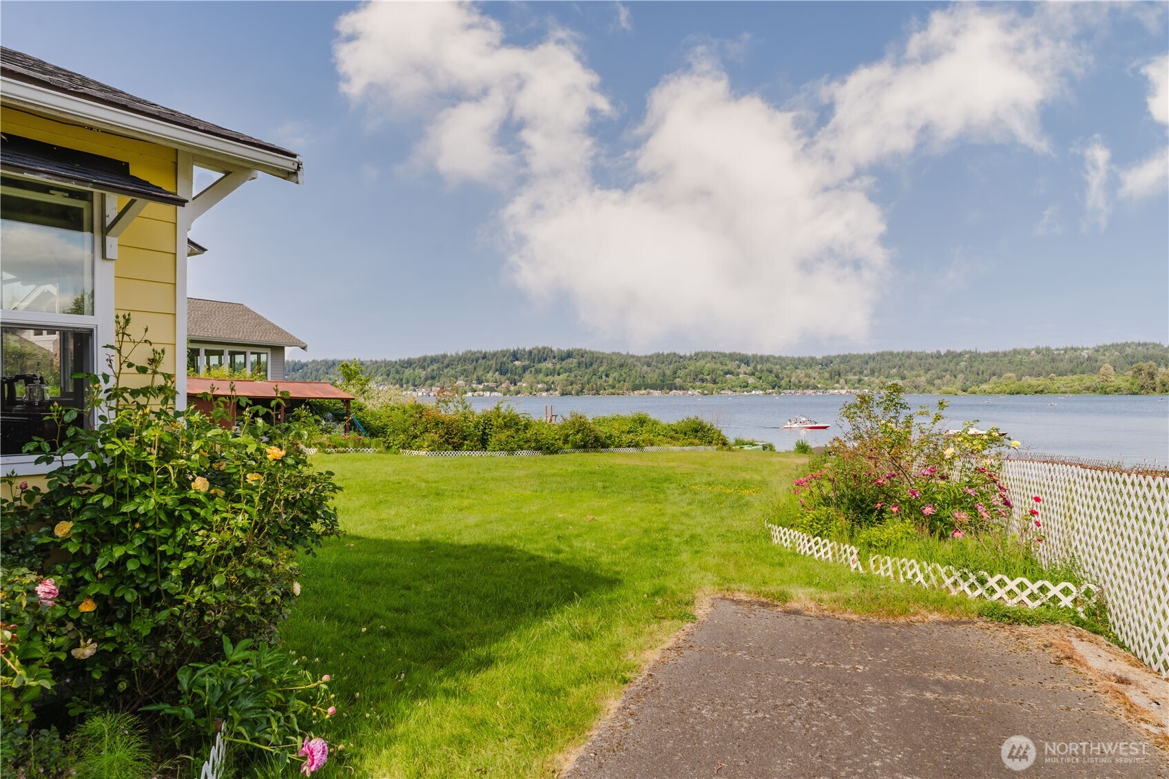 5104 Northwest Sammamish Road Issaquah, WA 98027 - Photo 10 of 24 a view of a lake with a big yard