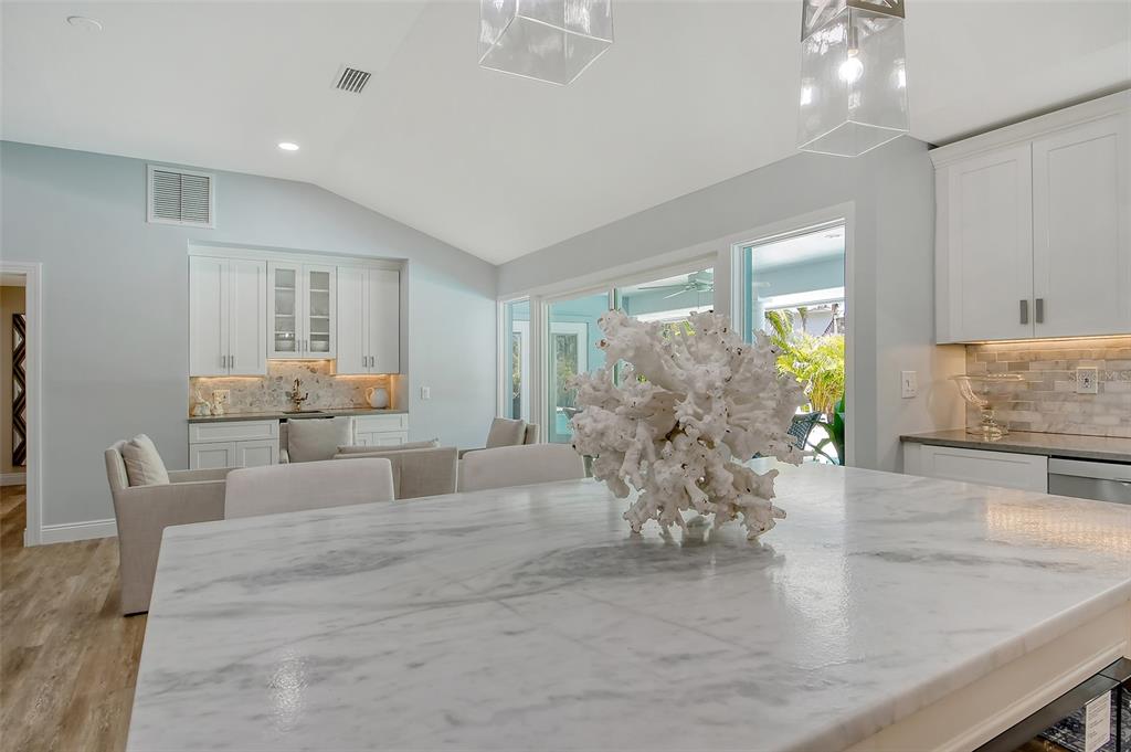 4852 Featherbed Lane Sarasota, FL 34242 - Photo 24 of 79 a living room with furniture and a large window