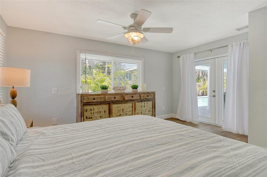4852 Featherbed Lane Sarasota, FL 34242 - Photo 38 of 79 a bed room with a bed and a window