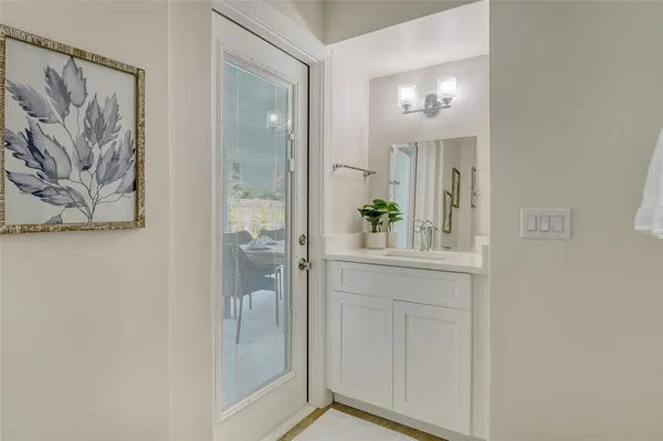 a house view with a sitting space and garden space