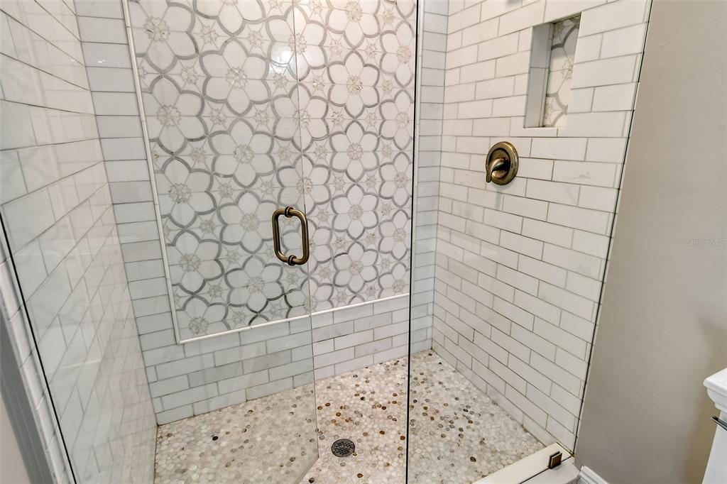 4852 Featherbed Lane Sarasota, FL 34242 - Photo 44 of 79 a bathroom with a shower