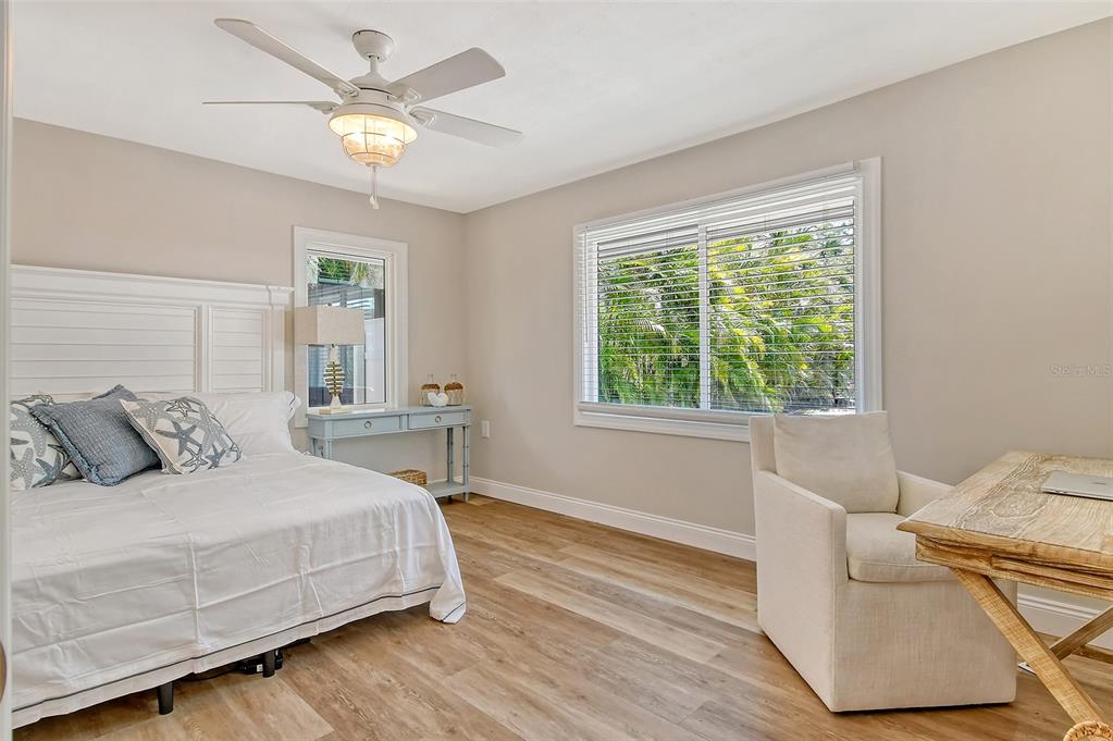 4852 Featherbed Lane Sarasota, FL 34242 - Photo 45 of 79 a bedroom with a bed and window