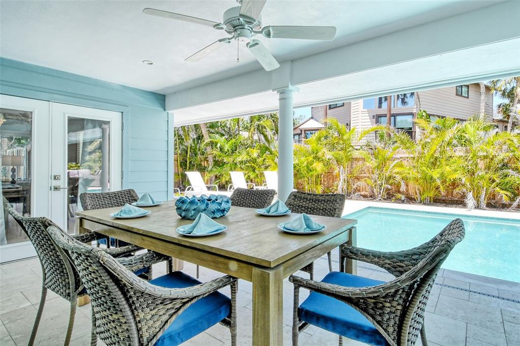 4852 Featherbed Lane Sarasota, FL 34242 - Photo 50 of 79 a view of a dining room with furniture window and outside view