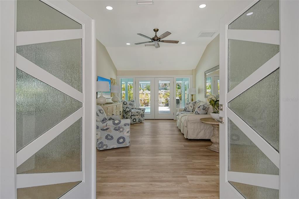 4852 Featherbed Lane Sarasota, FL 34242 - Photo 9 of 79 a living room with furniture and a large window