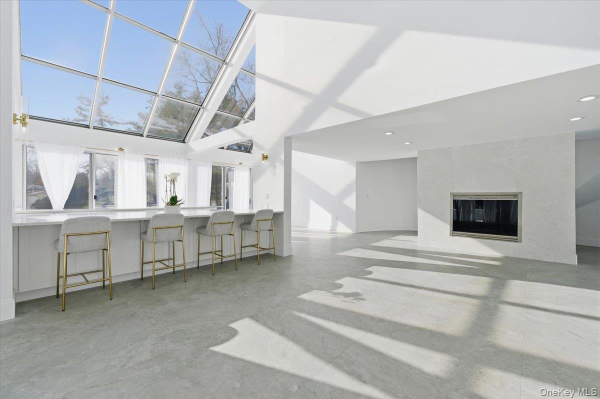 454 East Shore Road Great Neck, NY 11024 - Photo 15 of 42 a view of a room with racks on the wall