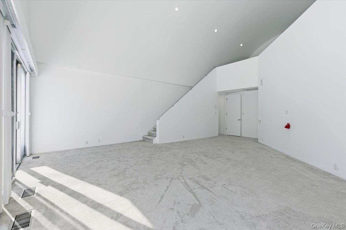 454 East Shore Road Great Neck, NY 11024 - Photo 29 of 48 a view of an empty room