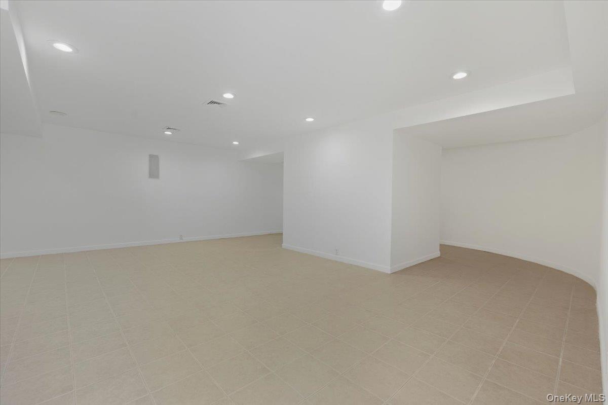 454 East Shore Road Great Neck, NY 11024 - Photo 40 of 48 a view of an empty room