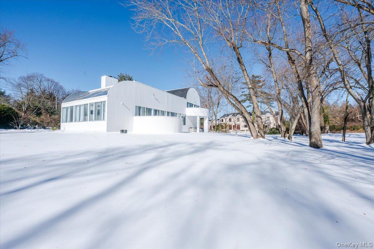 454 East Shore Road Great Neck, NY 11024 - Photo 41 of 42 a view of large building with a road