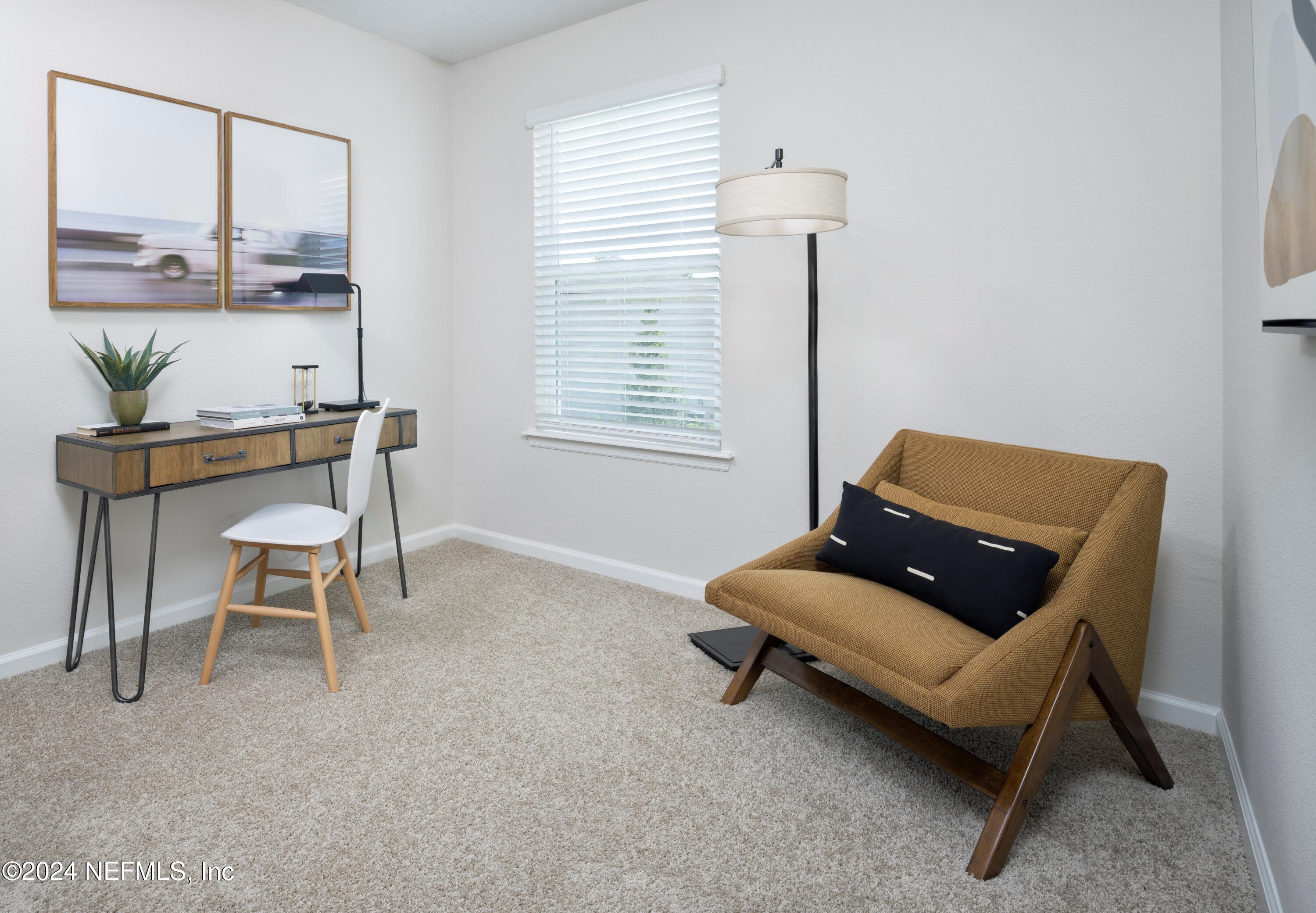 159 Harrow Cove St. Johns, FL 32259 - Photo 6 of 65 a living room with furniture and a window
