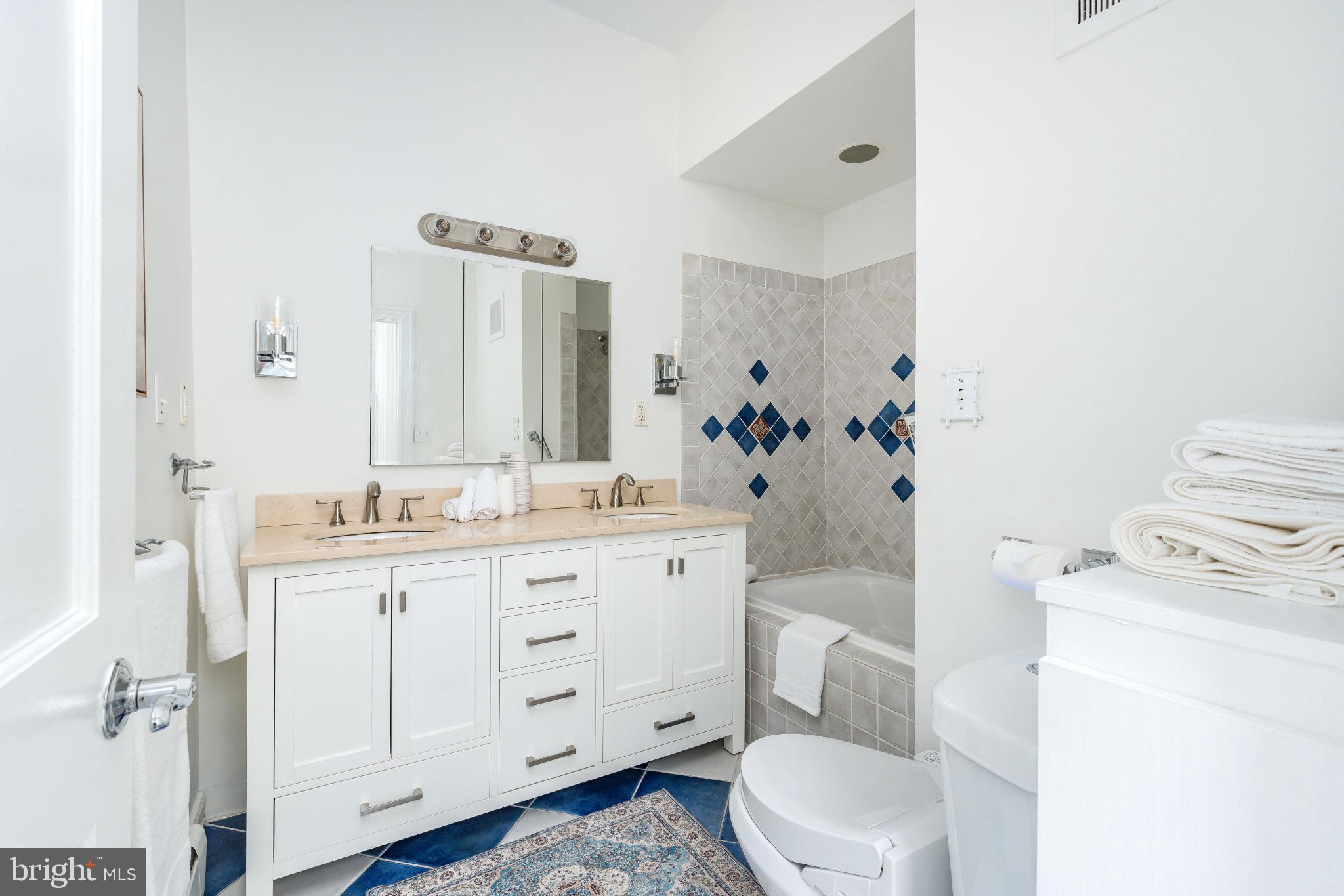 2046 Cherry Street Philadelphia, PA 19103 - Photo 21 of 61 Modern bathroom with elegant tile accents.