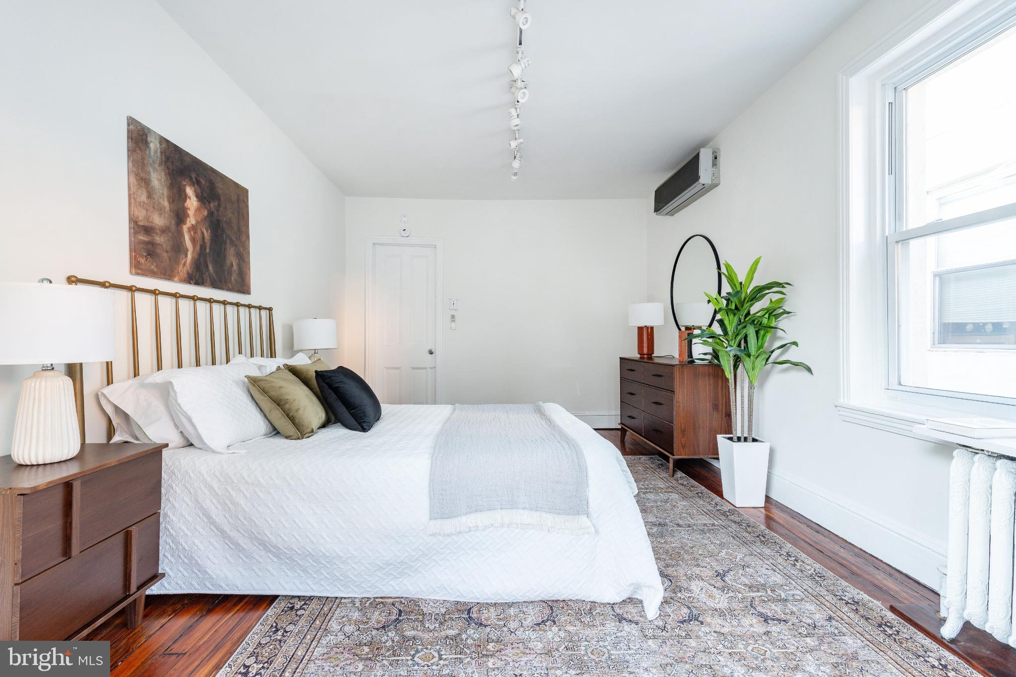 2046 Cherry Street Philadelphia, PA 19103 - Photo 33 of 61 Serene bedroom with natural light and style.