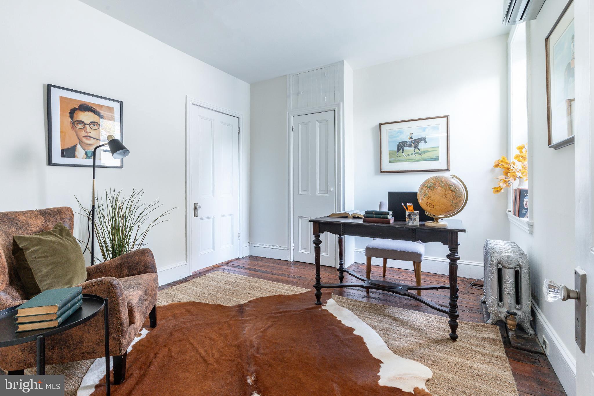 2046 Cherry Street Philadelphia, PA 19103 - Photo 35 of 61 Stylish workspace with artistic flair.