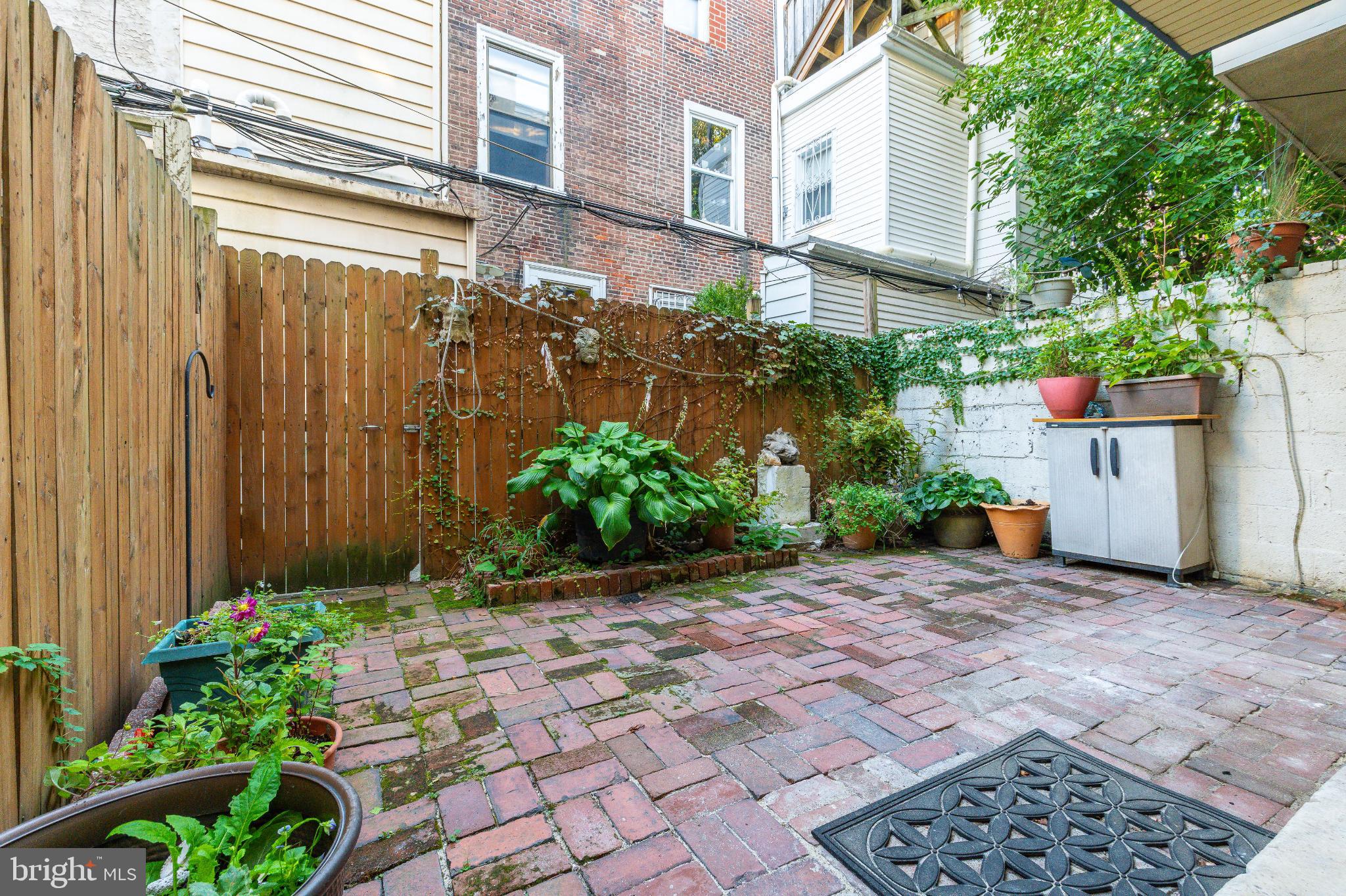 2046 Cherry Street Philadelphia, PA 19103 - Photo 44 of 61 Charming urban oasis with lush greenery.