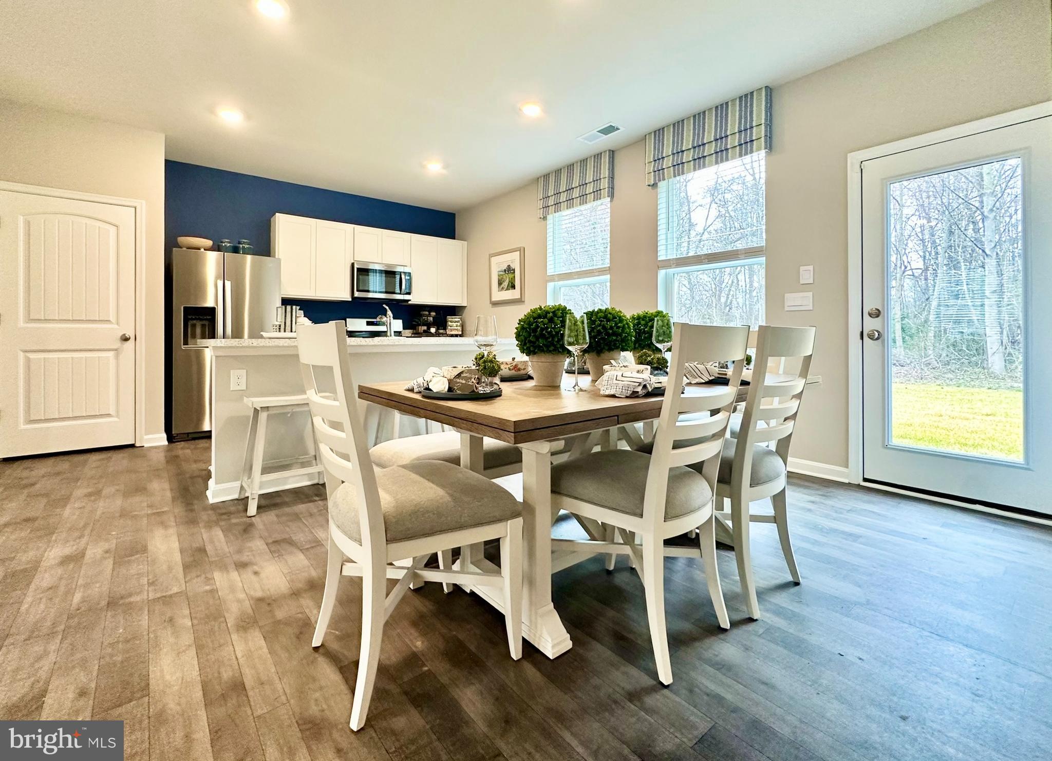 104 Red Haven Way Dover, DE 19904 - Photo 12 of 33 a dining room with furniture and window