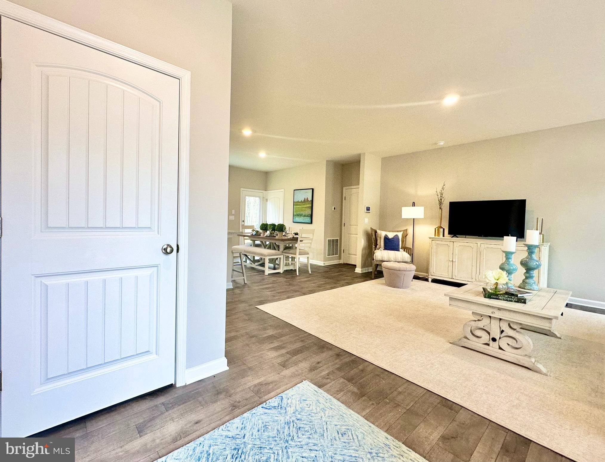 104 Red Haven Way Dover, DE 19904 - Photo 2 of 33 a living room with furniture and a flat screen tv
