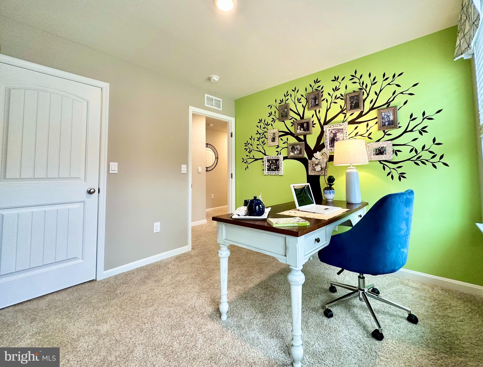 104 Red Haven Way Dover, DE 19904 - Photo 29 of 33 a room with furniture and a potted plant