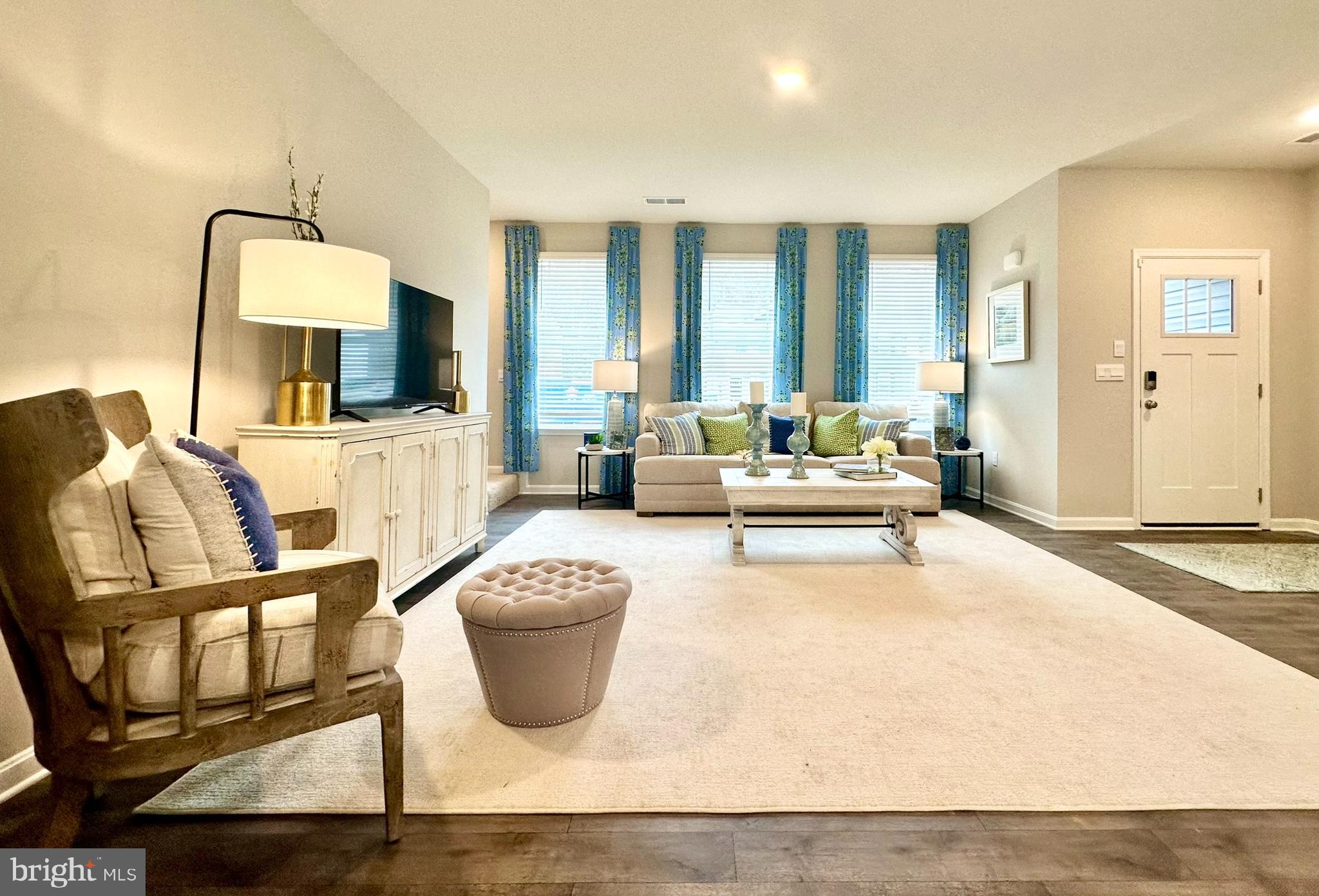 104 Red Haven Way Dover, DE 19904 - Photo 4 of 33 a living room with furniture and a flat screen tv