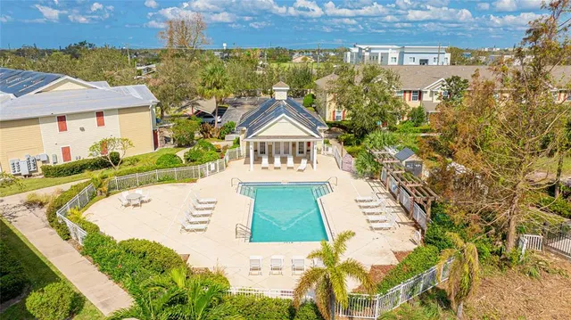 a view of swimming pool with a yard