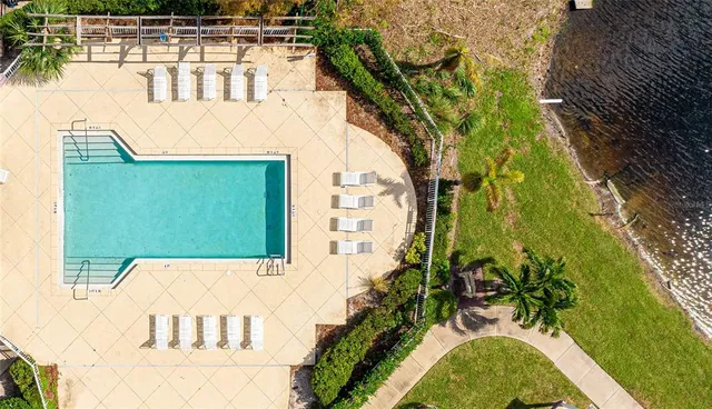 a view of swimming pool with a patio