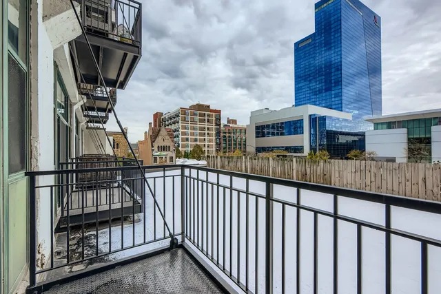 a view of balcony with a small yard