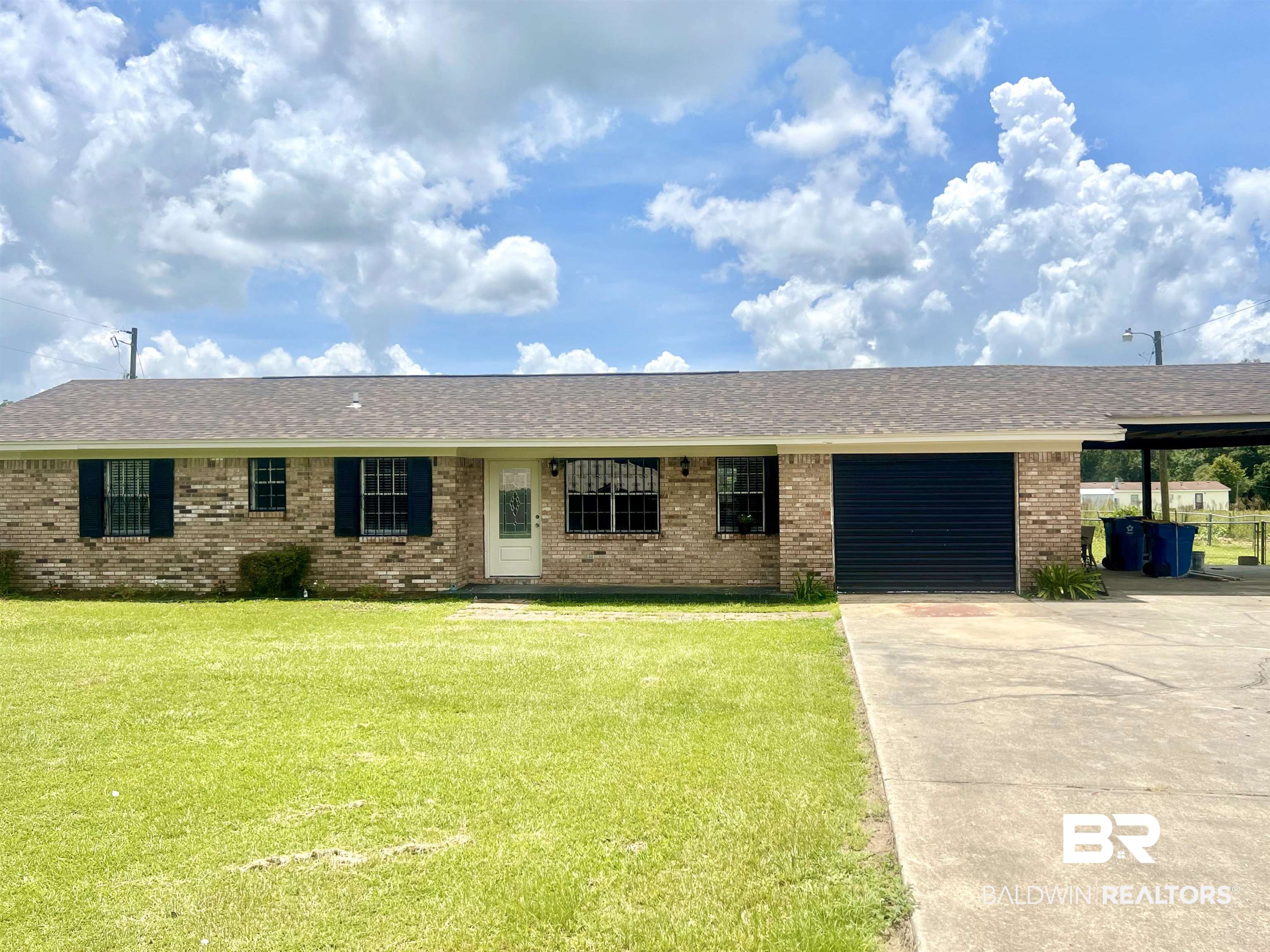 508 Freemanville Drive Atmore, AL 36502 - Photo 2 of 27 Ranch-style house featuring a front yard