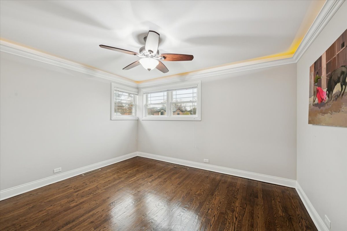 241 Glendale Road Glenview, IL 60025 - Photo 12 of 29 wooden floor in an empty room with a window