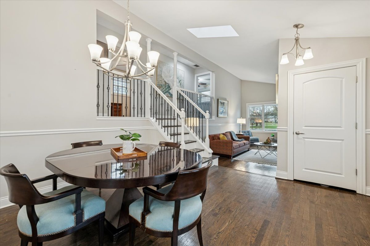 241 Glendale Road Glenview, IL 60025 - Photo 4 of 29 a view of a dining room with furniture and wooden floor