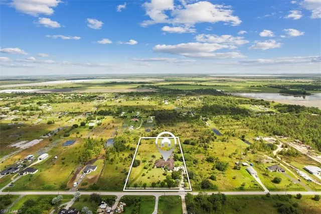 a view of a lake with a yard