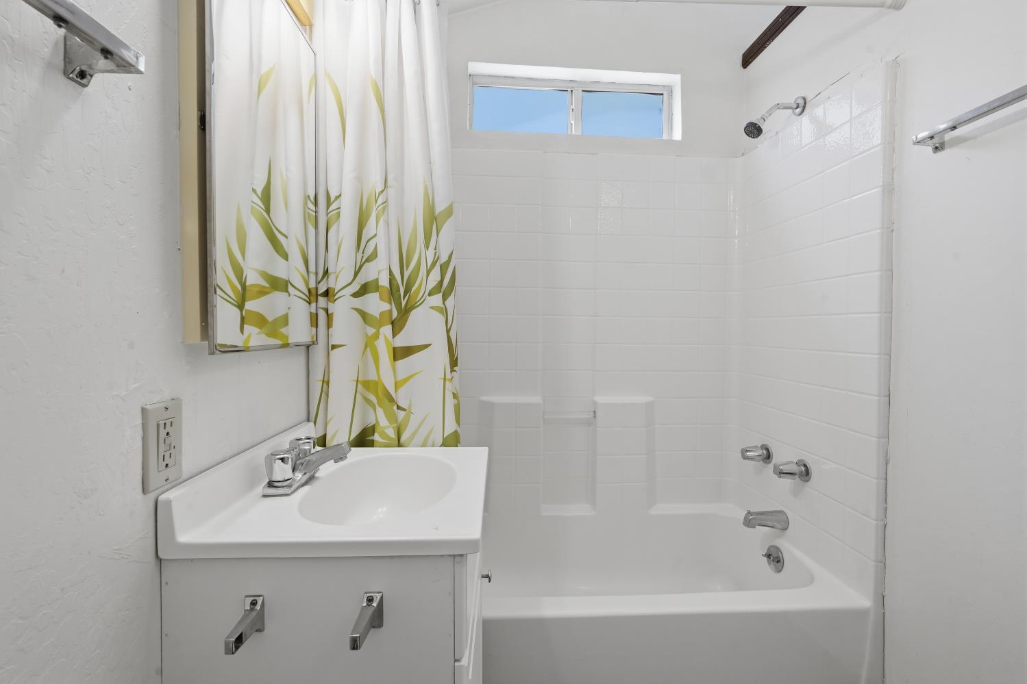 13351 Newtown Road Nevada City, CA 95959 - Photo 50 of 50 a bathroom with a sink a bathtub and a window