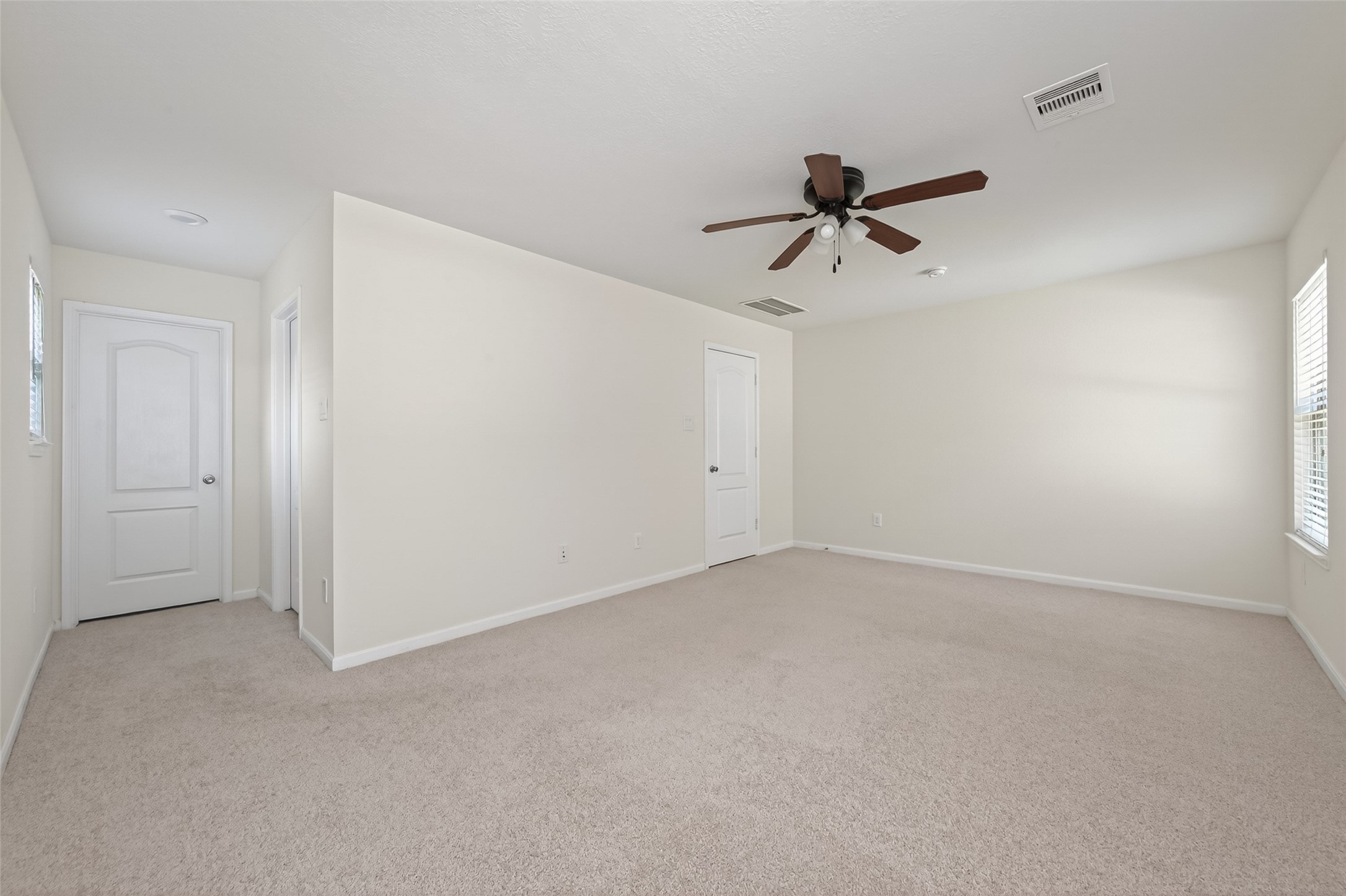 2754 Cayden Creek Way Conroe, TX 77304 - Photo 25 of 40 wooden floor in an empty room