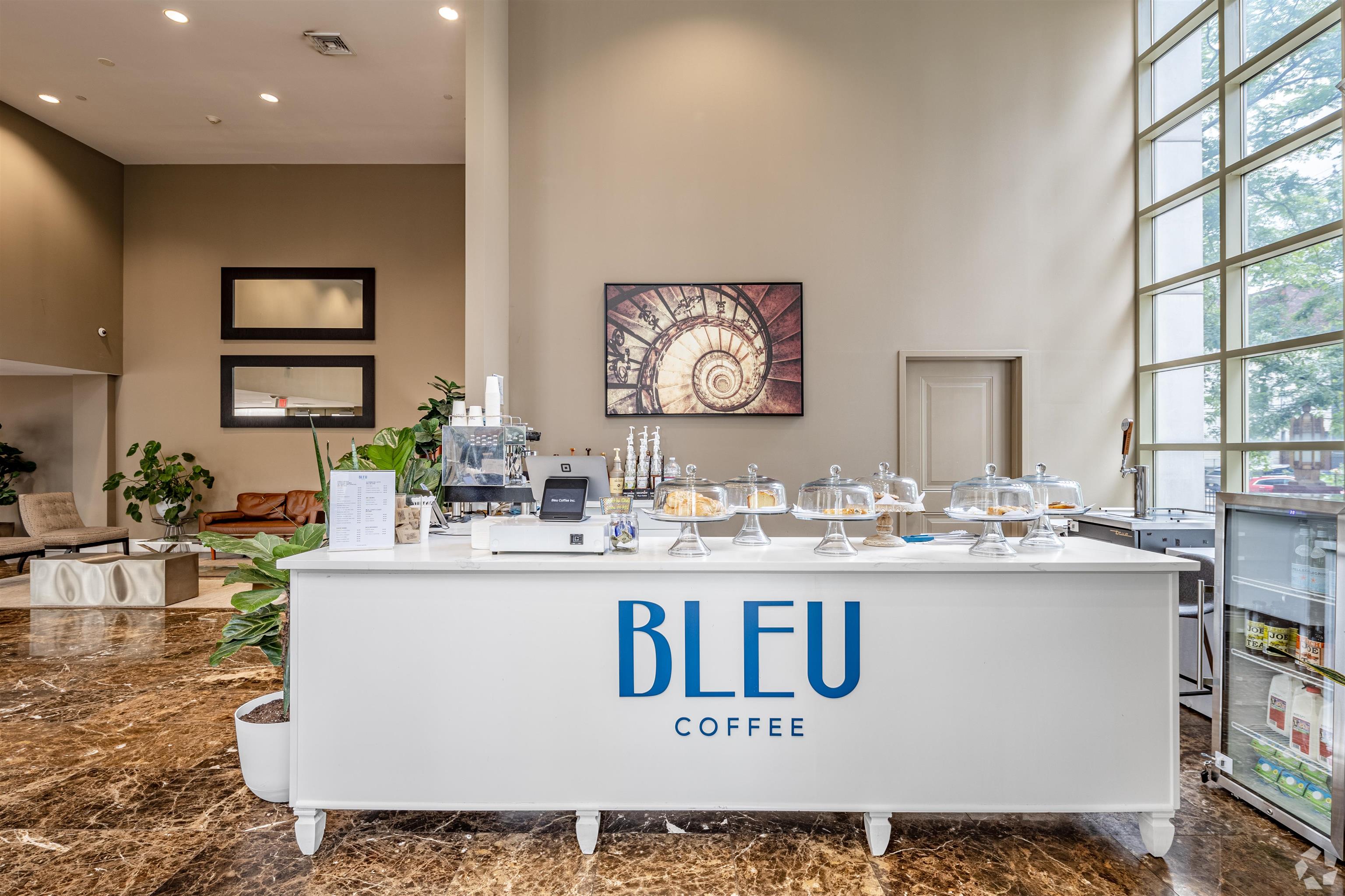 20 Beacon Way, Unit TB04 Jersey City, NJ 07304 - Photo 15 of 21 a kitchen with kitchen island counter top space