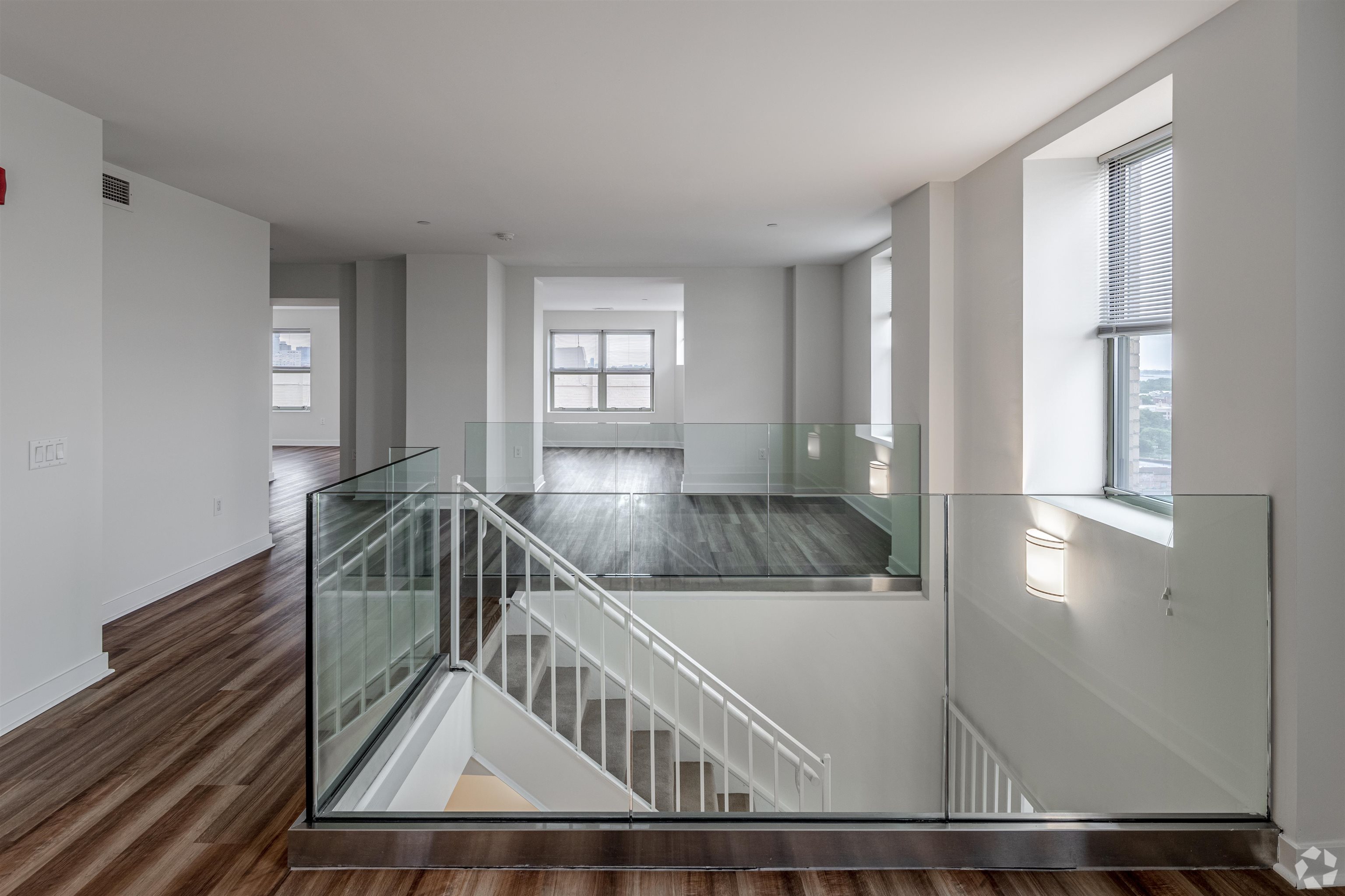 20 Beacon Way, Unit TB04 Jersey City, NJ 07304 - Photo 2 of 21 a view of entryway and hall with wooden floor